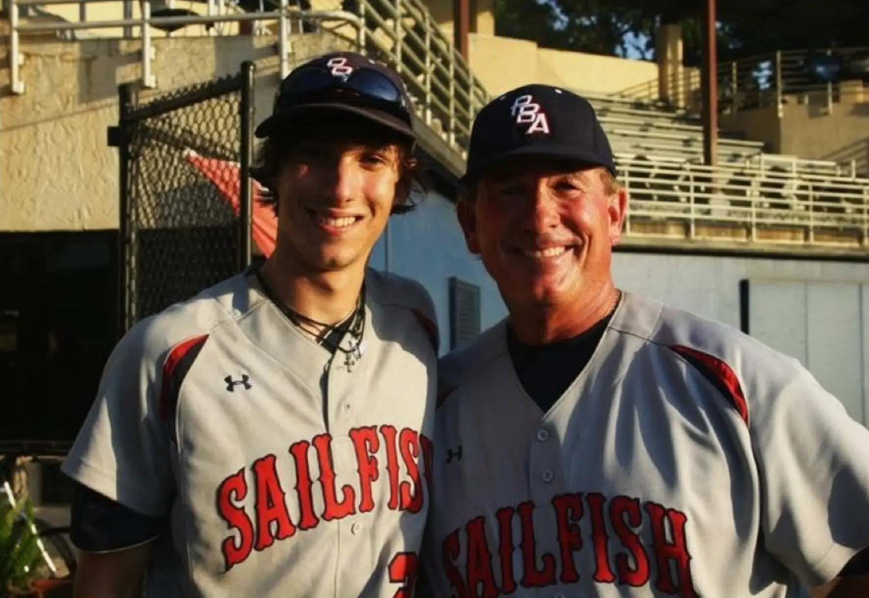 Justin Sizemore with a coach during his college playing days