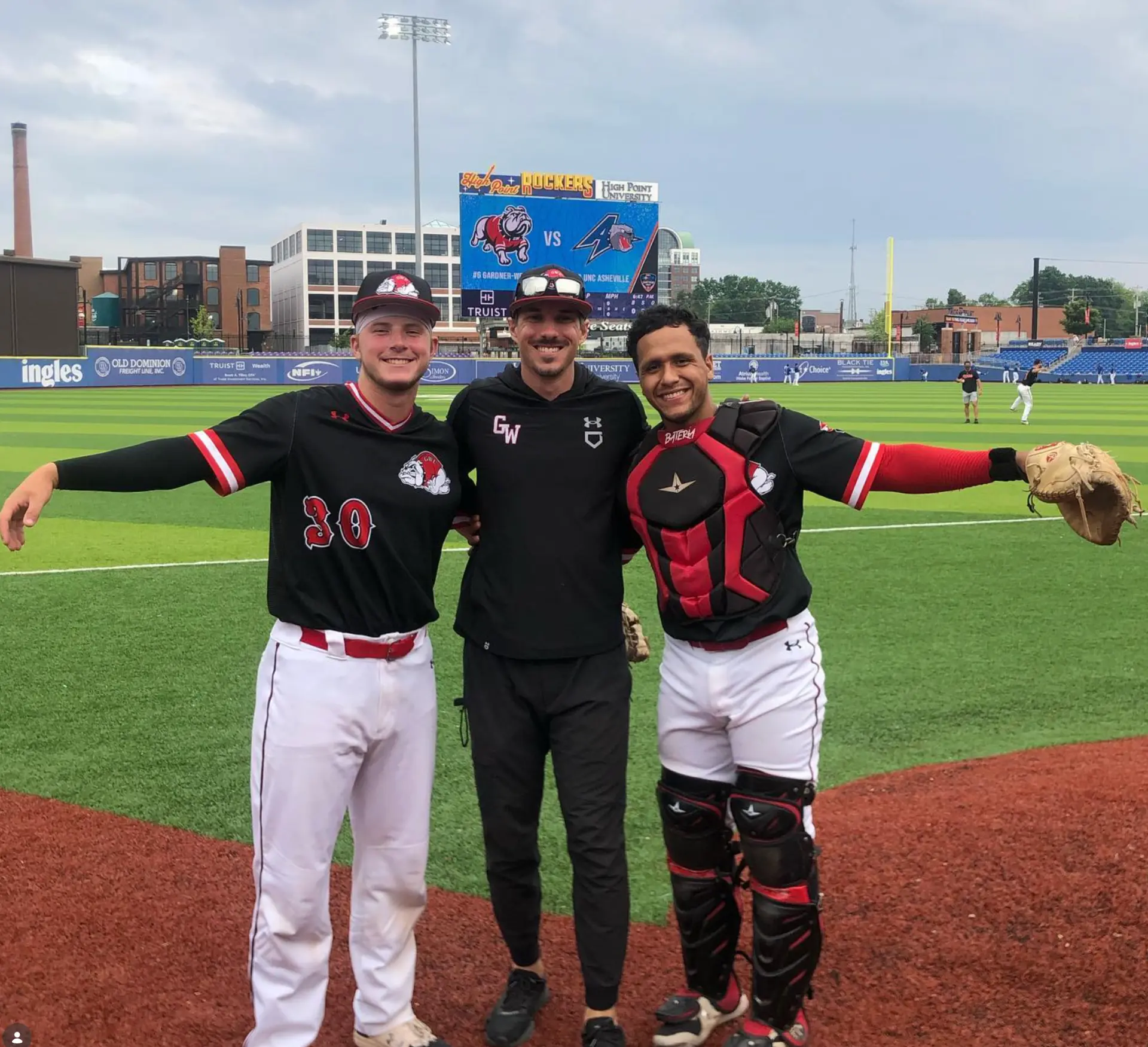 Justin Sizemore with Gardner-Webb players after a game